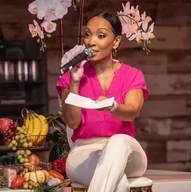 PITP MARIA MORE Speaking into a microphone.