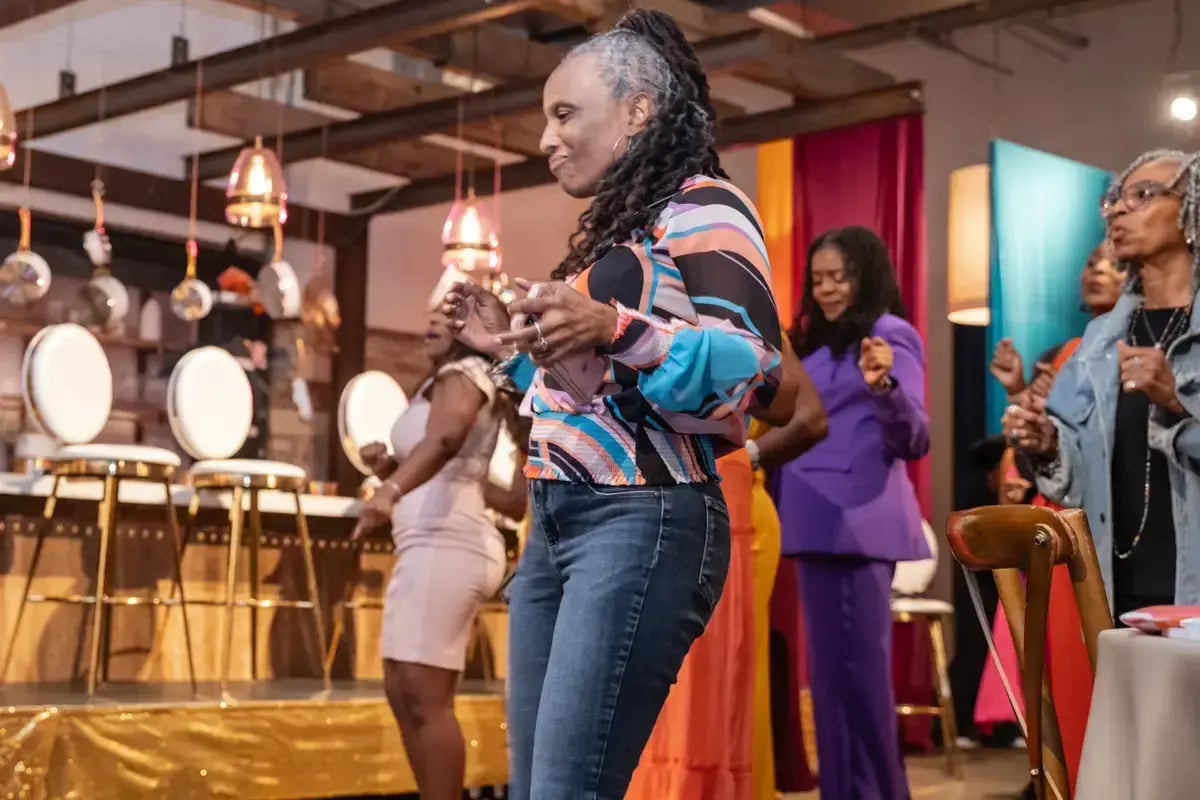 Group of black woman dancing and smiling