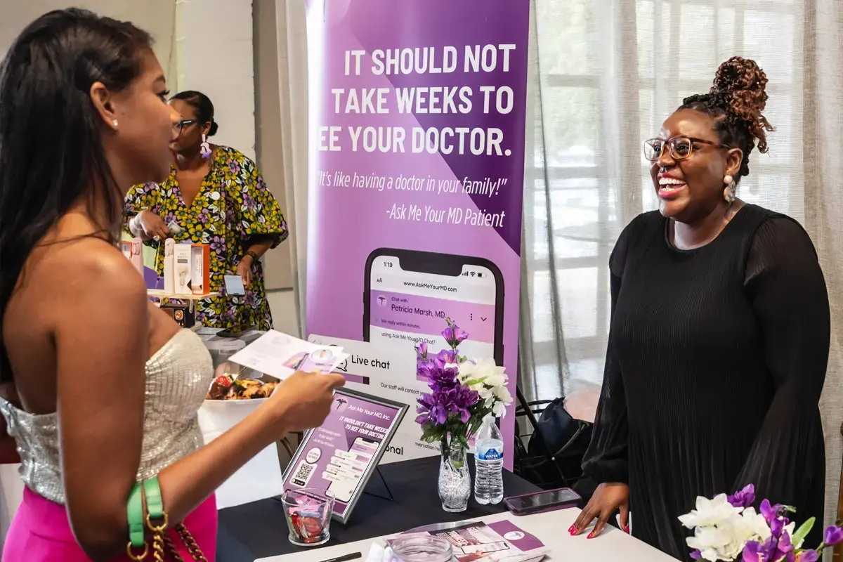 Young Black woman at the reception table